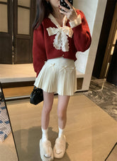 Minifalda plisada con lazo pequeño